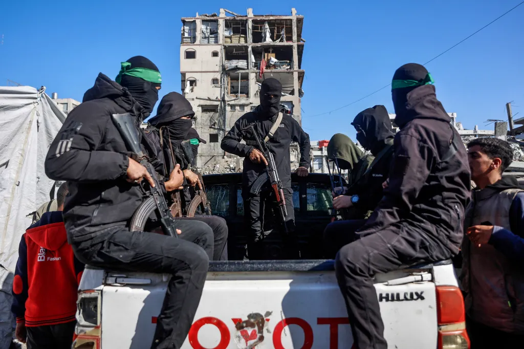 Hamas militants with automatic weapons in the back of a pickup truck in the Gaza Strip.