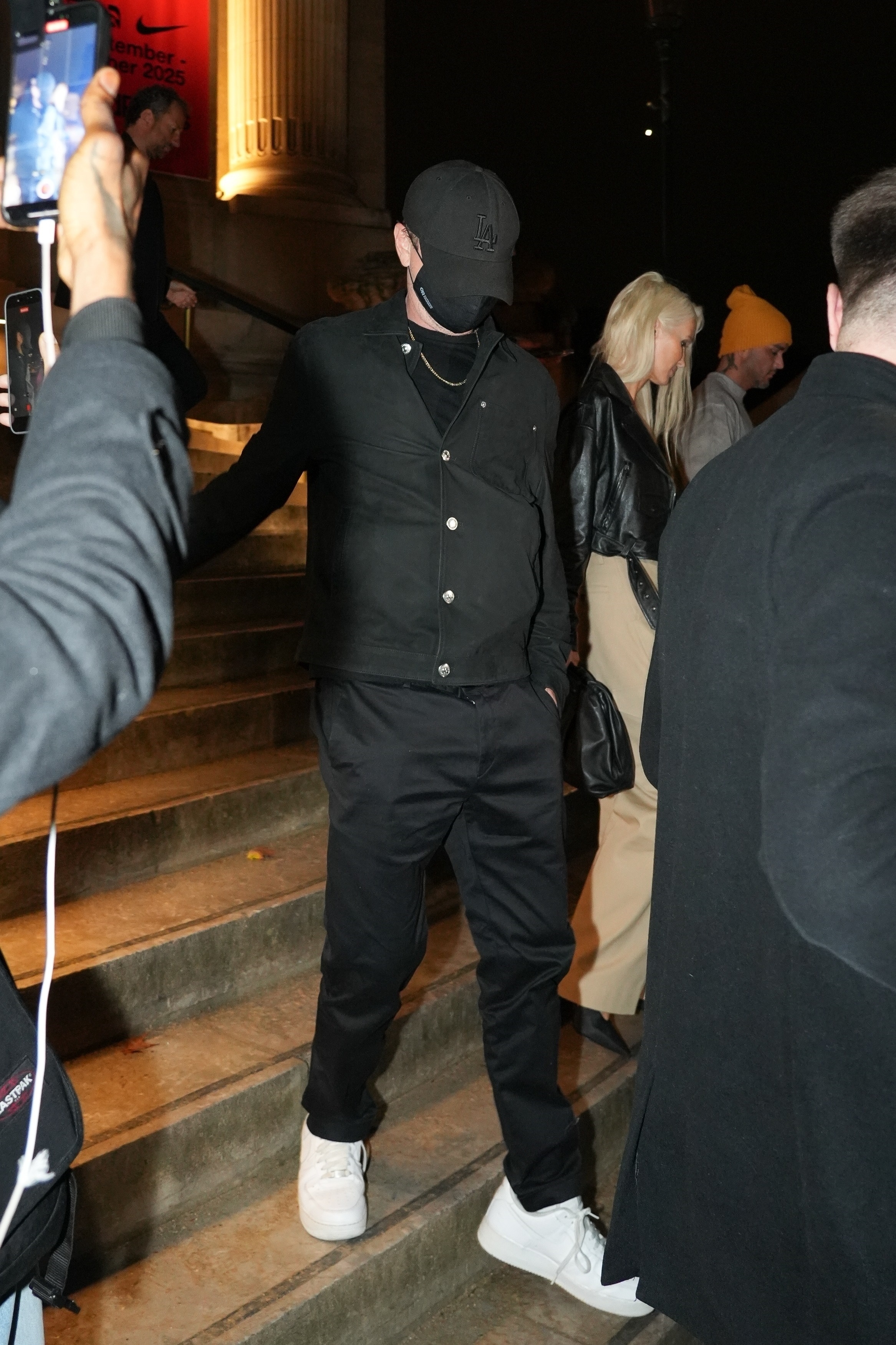Leonardo DiCaprio and Vittoria Ceretti leaving a party at the Grand Palais in Paris.