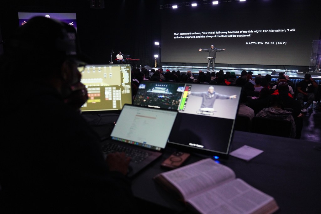 Pastor Philip Anthony Mitchell preaches at 2819 Church in Atlanta, with Matthew 26:31 (ESV) displayed behind him.