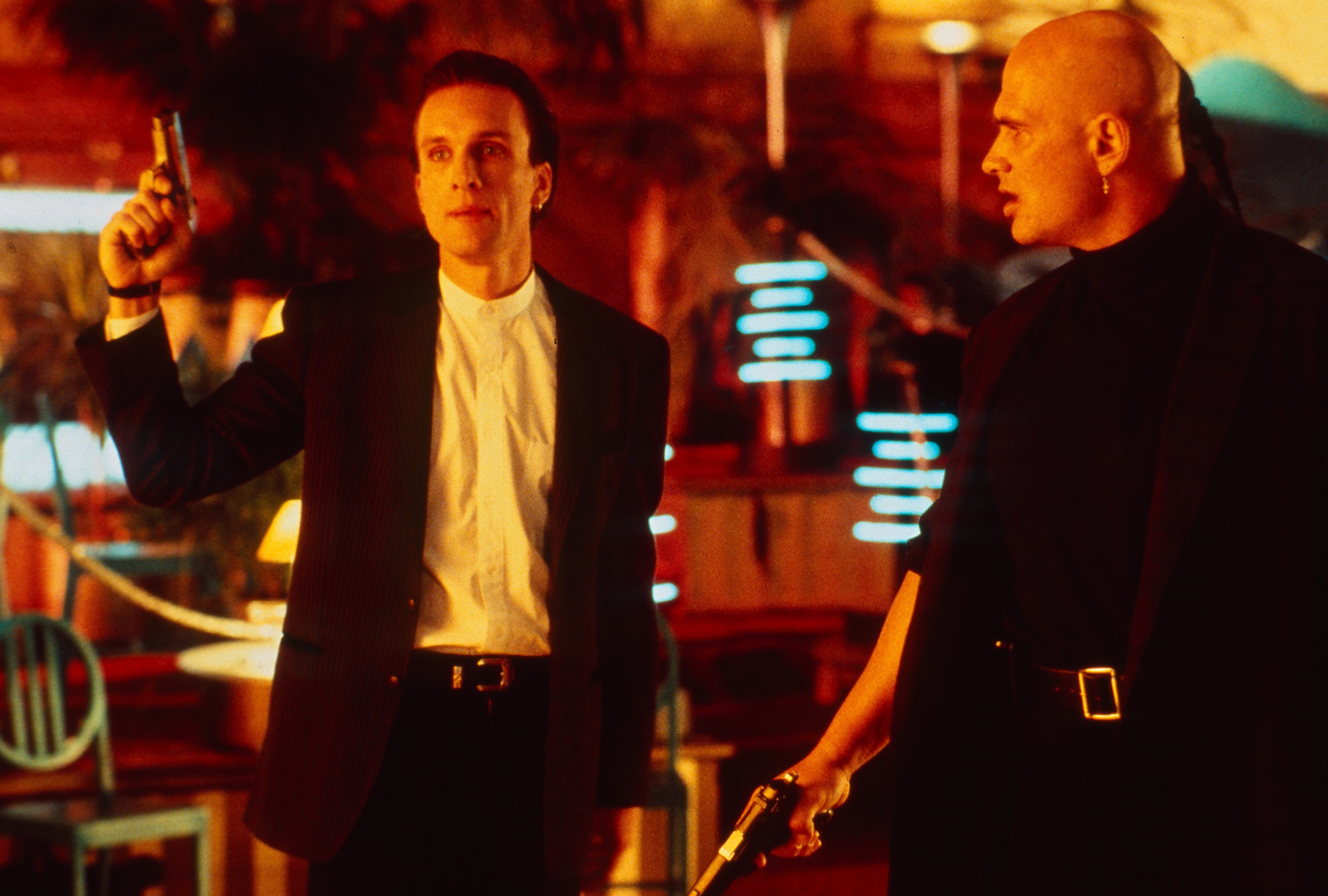 Peter Greene holding a gun in