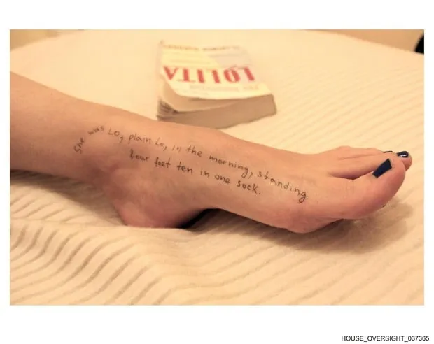 Foot with a tattoo of a line from