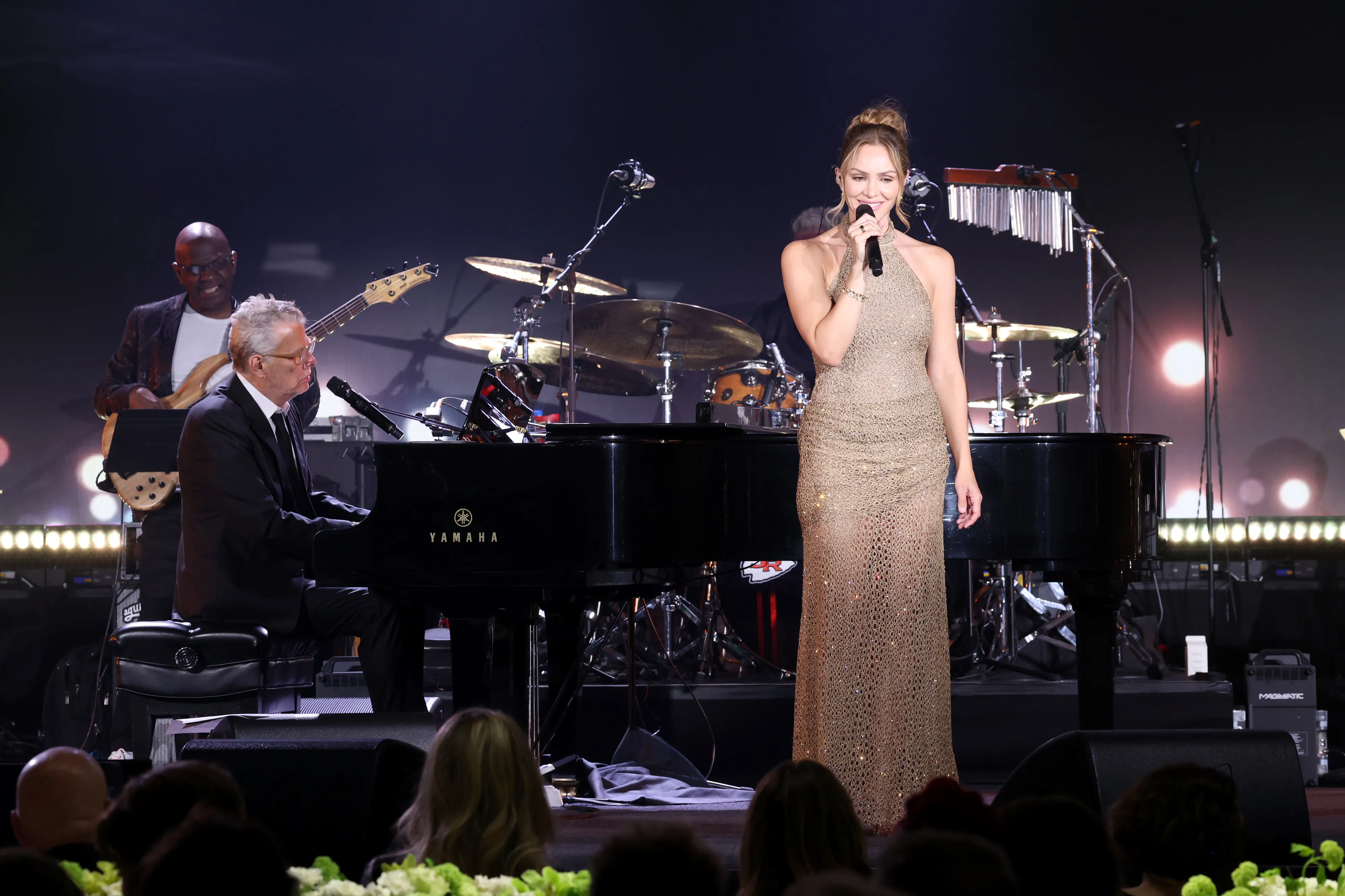  David Foster and Katharine McPhee perform onstage.