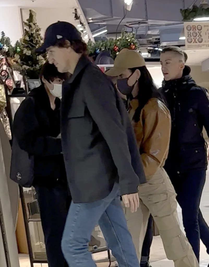 Katy Perry and Justin Trudeau holding hands in Tokyo.