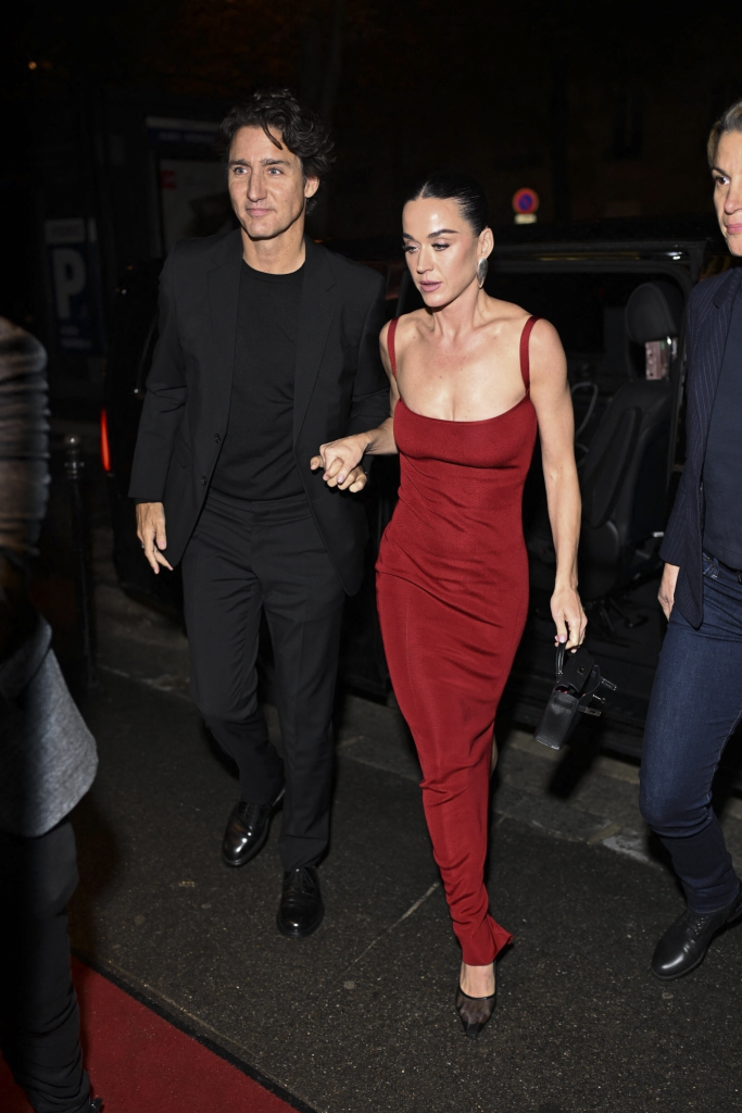 Katy Perry and Justin Trudeau walk hand-in-hand while arriving at Crazy Horse Paris for her 41st birthday celebration.