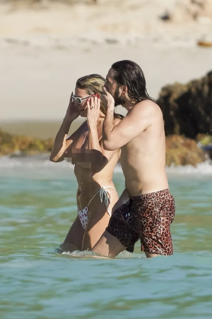 Heidi Klum and Tom Kaulitz in the water at Saint-Barth beach.