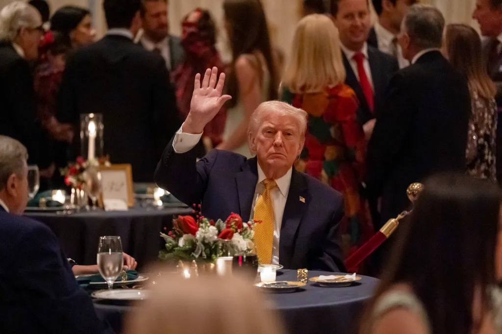 President Donald Trump reacts during a Christmas Eve dinner at Mar-a-Lago in Palm Beach, Florida, on Dec. 24, 2025.