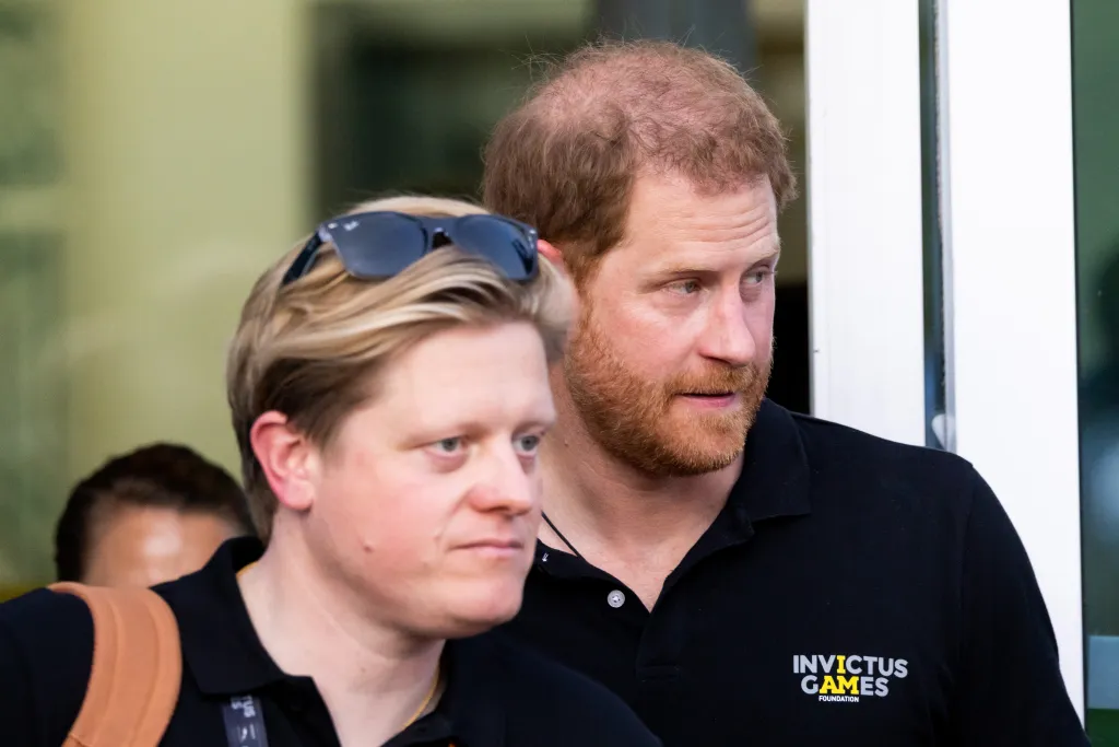 Prince Harry and James Holt after the swimming finals at the Invictus Games.