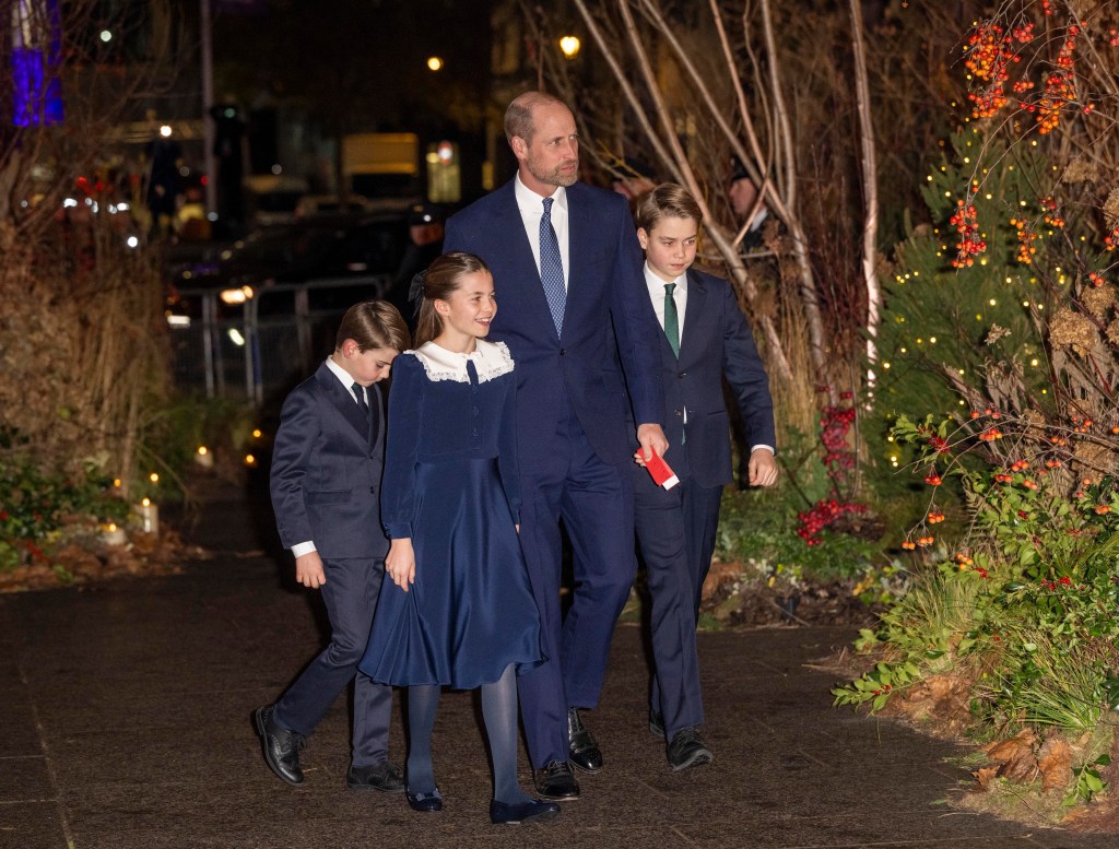 Prince William and his children, Prince George, Princess Charlotte, and Prince Louis, walk together at an evening carol service.
