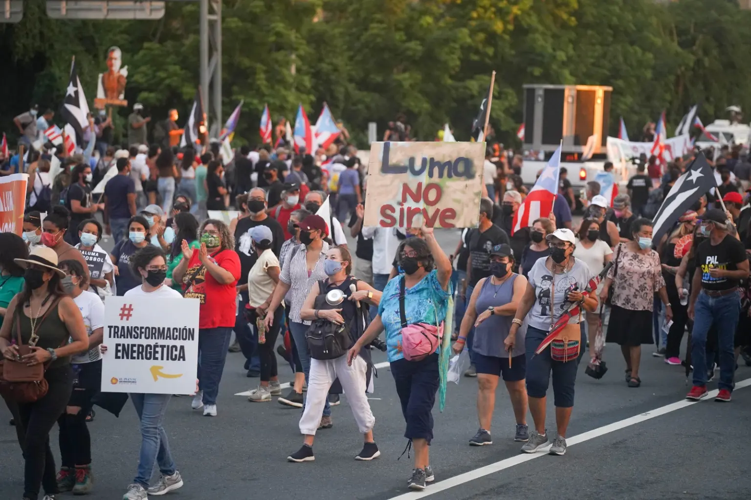 Protesters march against an energy company in Puerto Rico