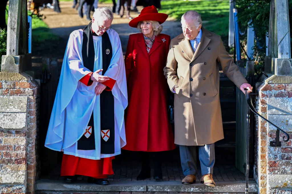 Queen Camilla, King Charles II, and a priest exiting a church service.
