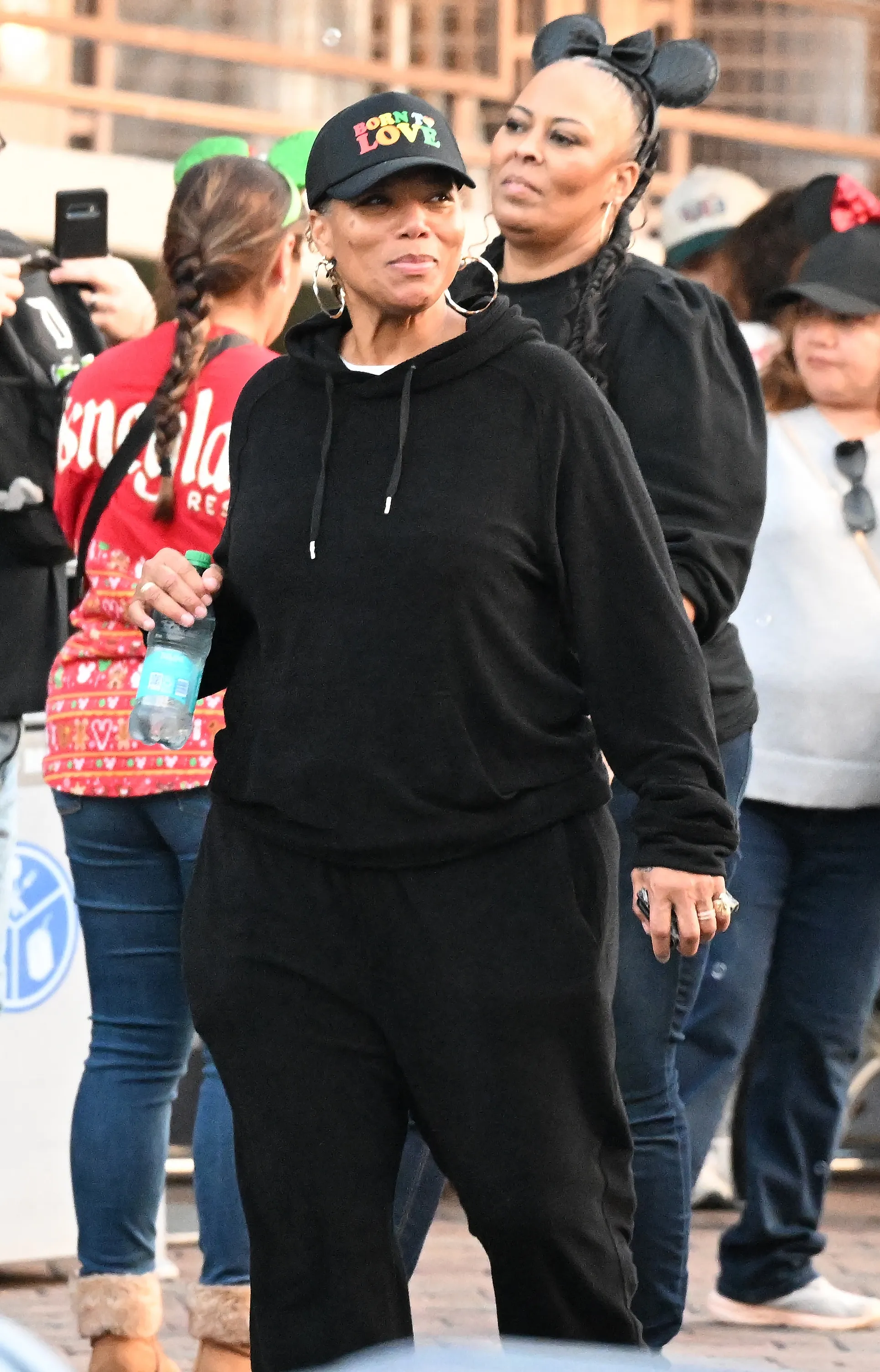 Queen Latifah and Eboni Nichols walking at Disneyland.