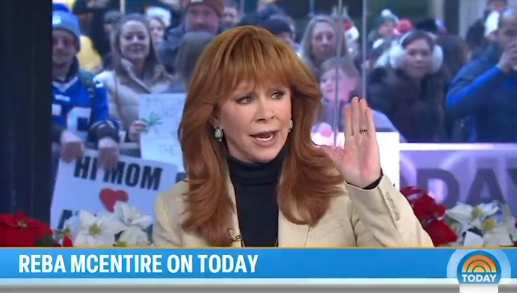 Reba McEntire speaking on the Today Show, correcting her relationship status.