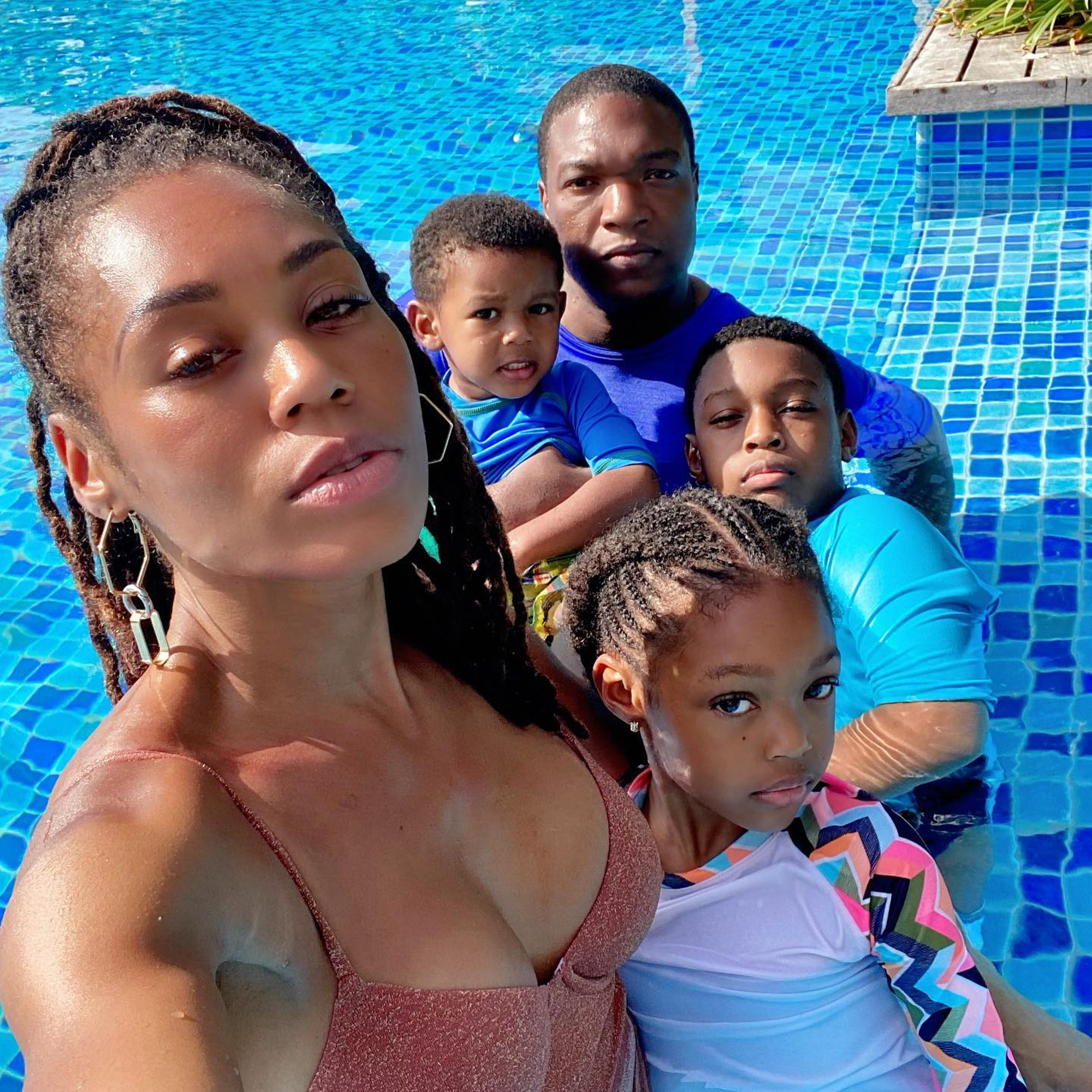 Monique and Chris Samuels with their kids