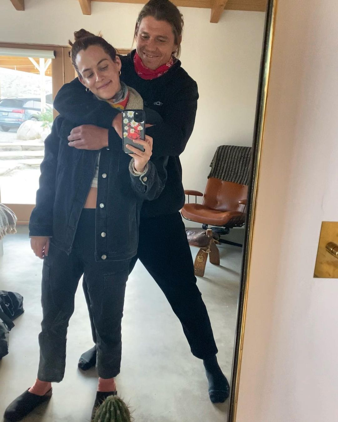 A mirror selfie of Riley Keough and Ben Smith-Petersen