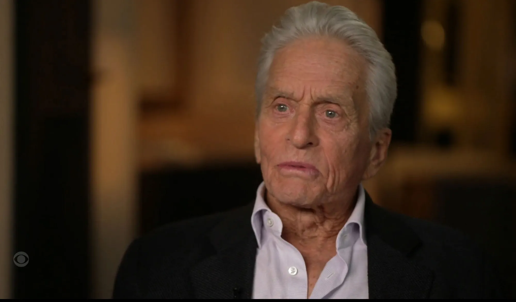 Michael Douglas speaking during the CBS News special 