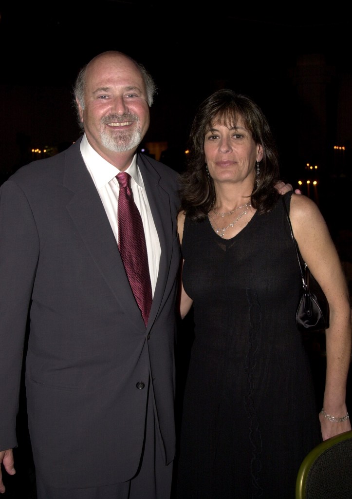 Rob Reiner and his wife, Michele Reiner, stand together.