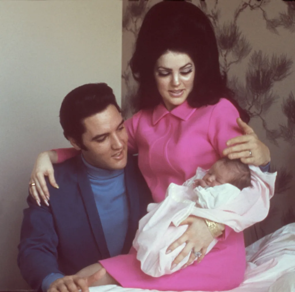 Elvis Presley, Priscilla Presley, and their daughter Lisa Marie Presley.