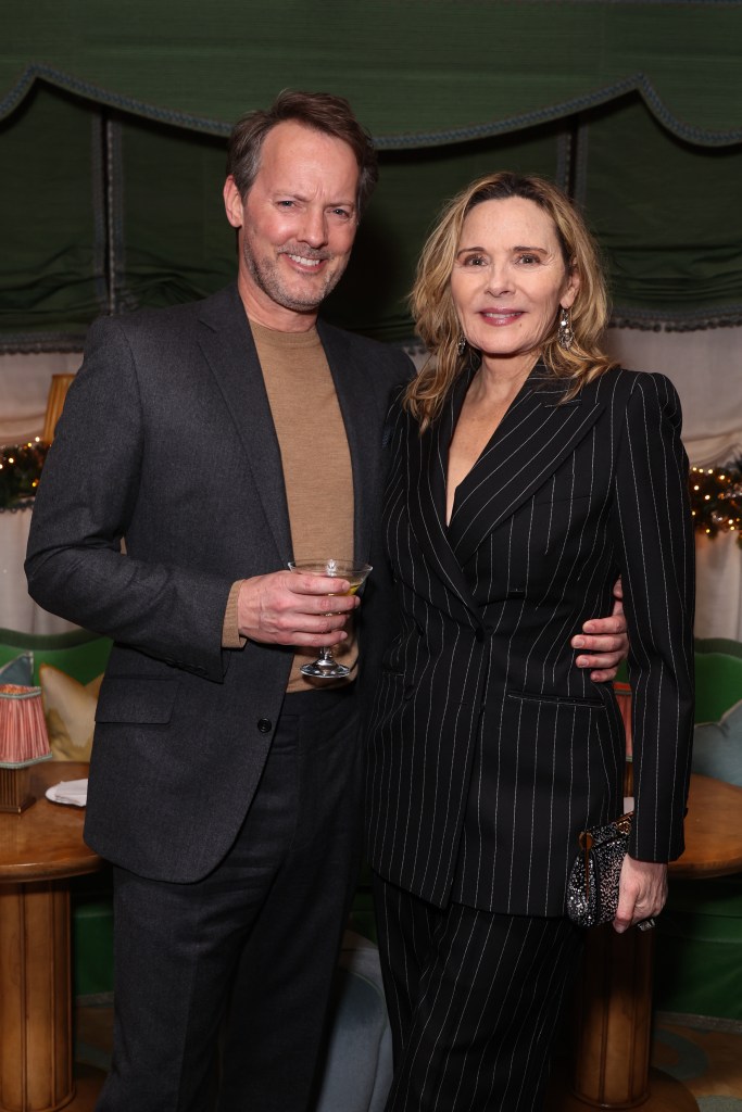 Russell Thomas and Kim Cattrall attend the Perfect X Dolce & Gabbana Beauty Christmas party.