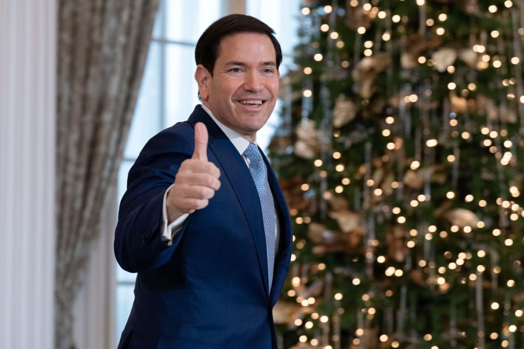Marco Rubio gives a thumbs-up.