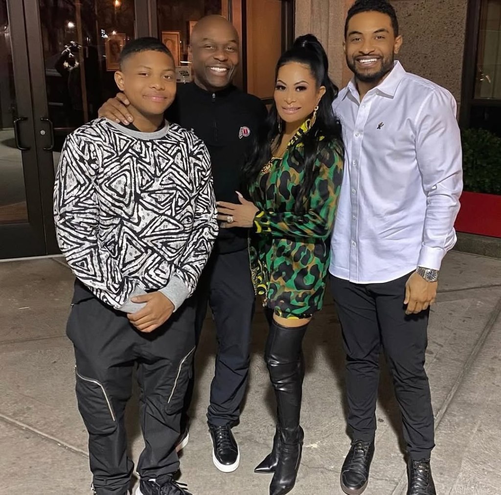 Jen Shah reunites with her family, posing with her husband and two sons.