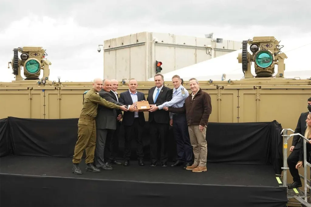 Senior Israeli defense and industry officials at the handover ceremony for the Iron Beam laser air defense system.
