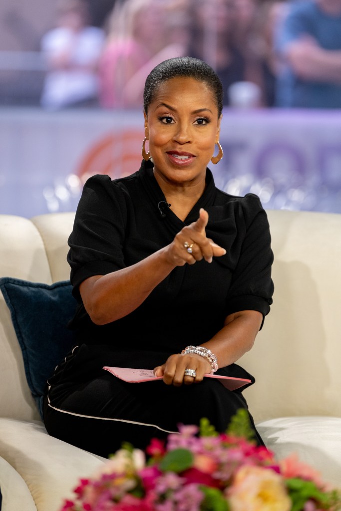 A woman in a black shirt.