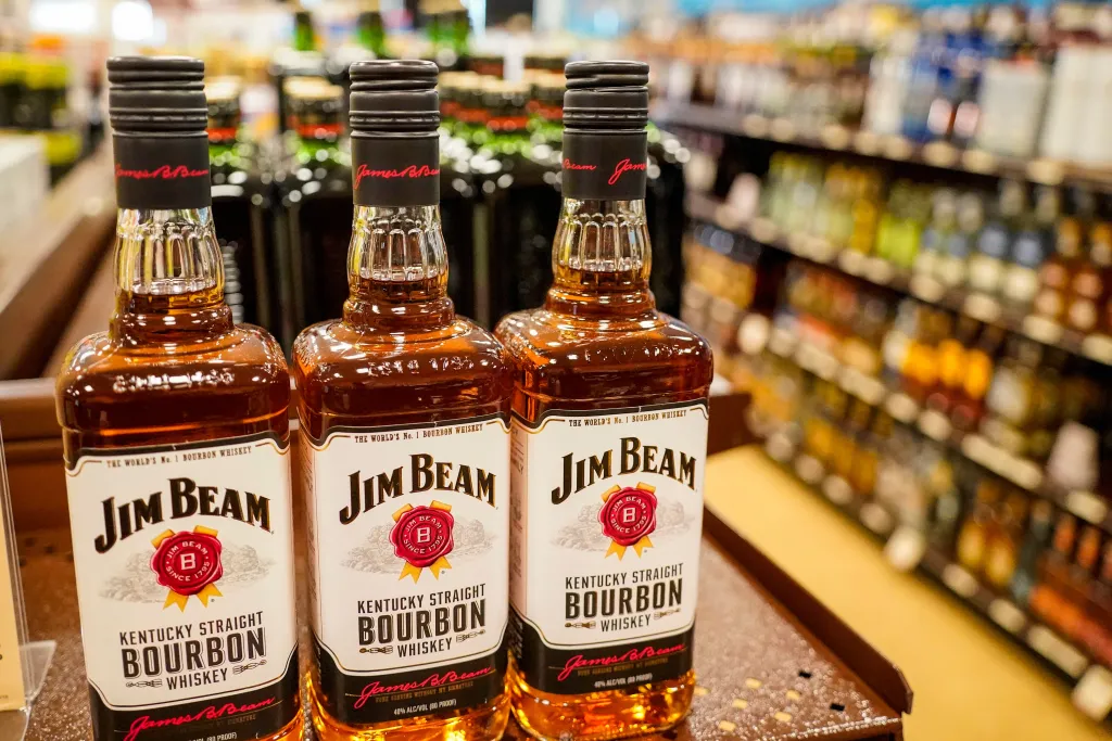 Shelves display bottles of bourbons for sale at a Pennsylvania fine wine and spirits store