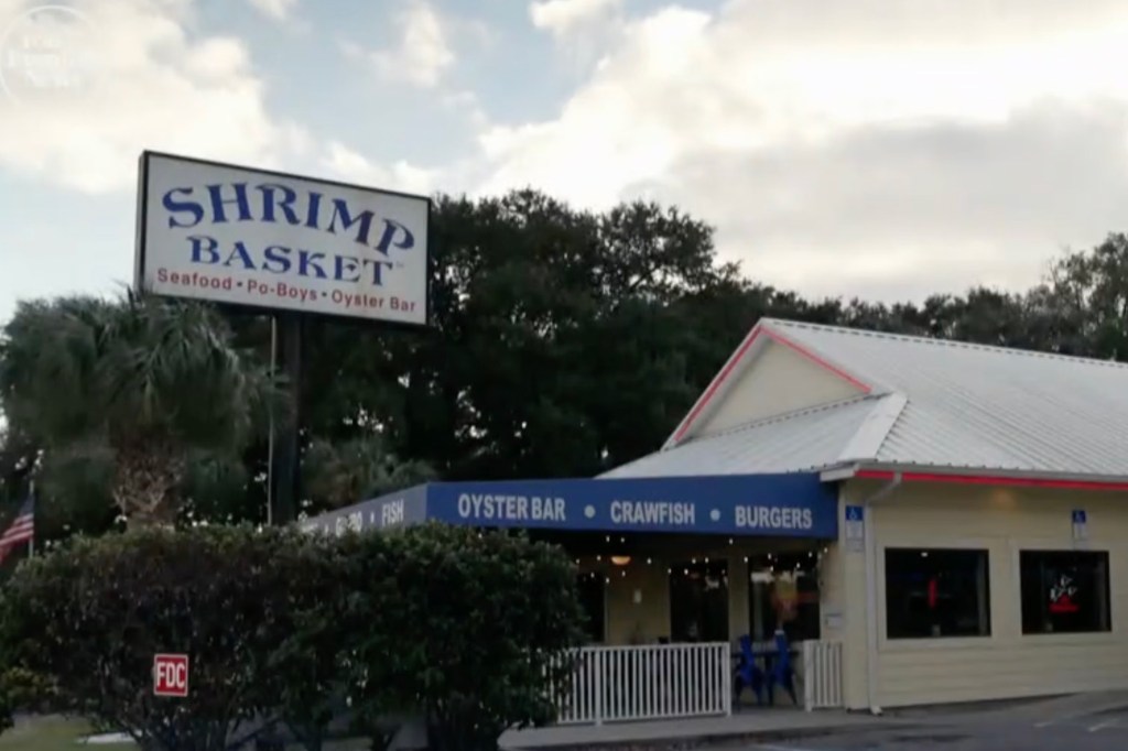 A photo of the exterior of a Shrimp Basket restaurant.