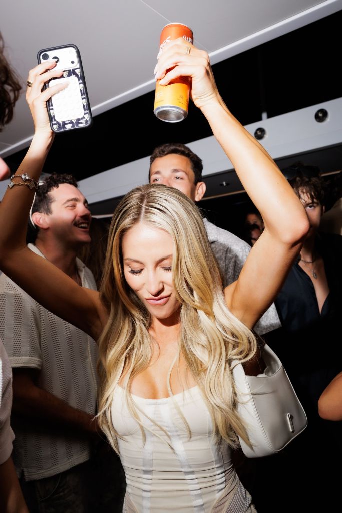 Alix Earle celebrating at an Art Basel Miami party.