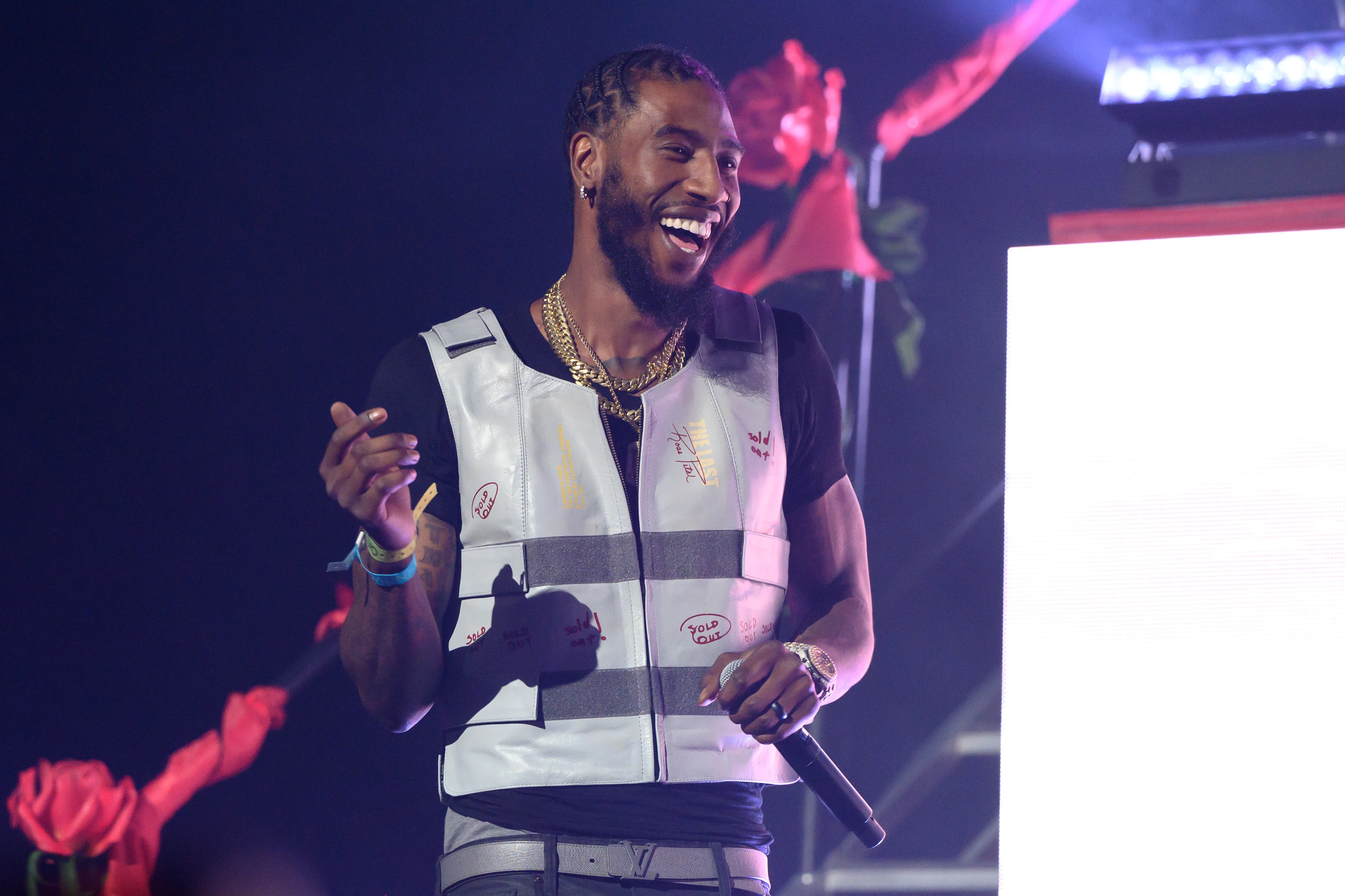 Iman Shumpert performing on stage.