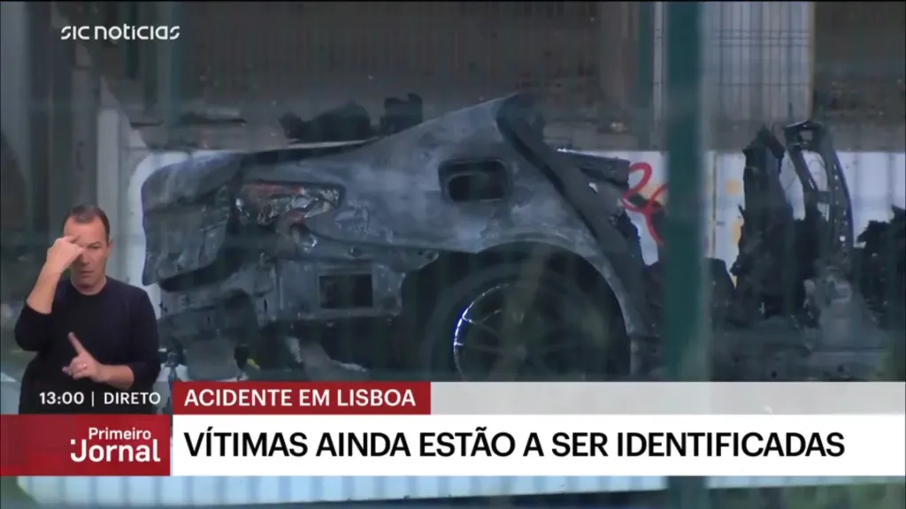 Burnt car wreckage from a fireball crash that killed six people in Lisbon.