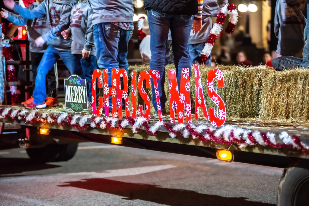 A Christmas parade float with red