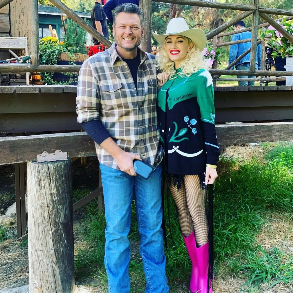Gwen Stefani in a cowboy hat and pink boots with fiance Blake Shelton.