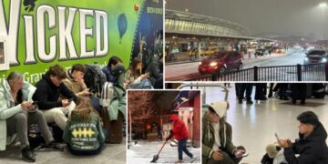 Holiday travelers stranded at JFK Airport as winter storm triggers hundreds of flight cancellations