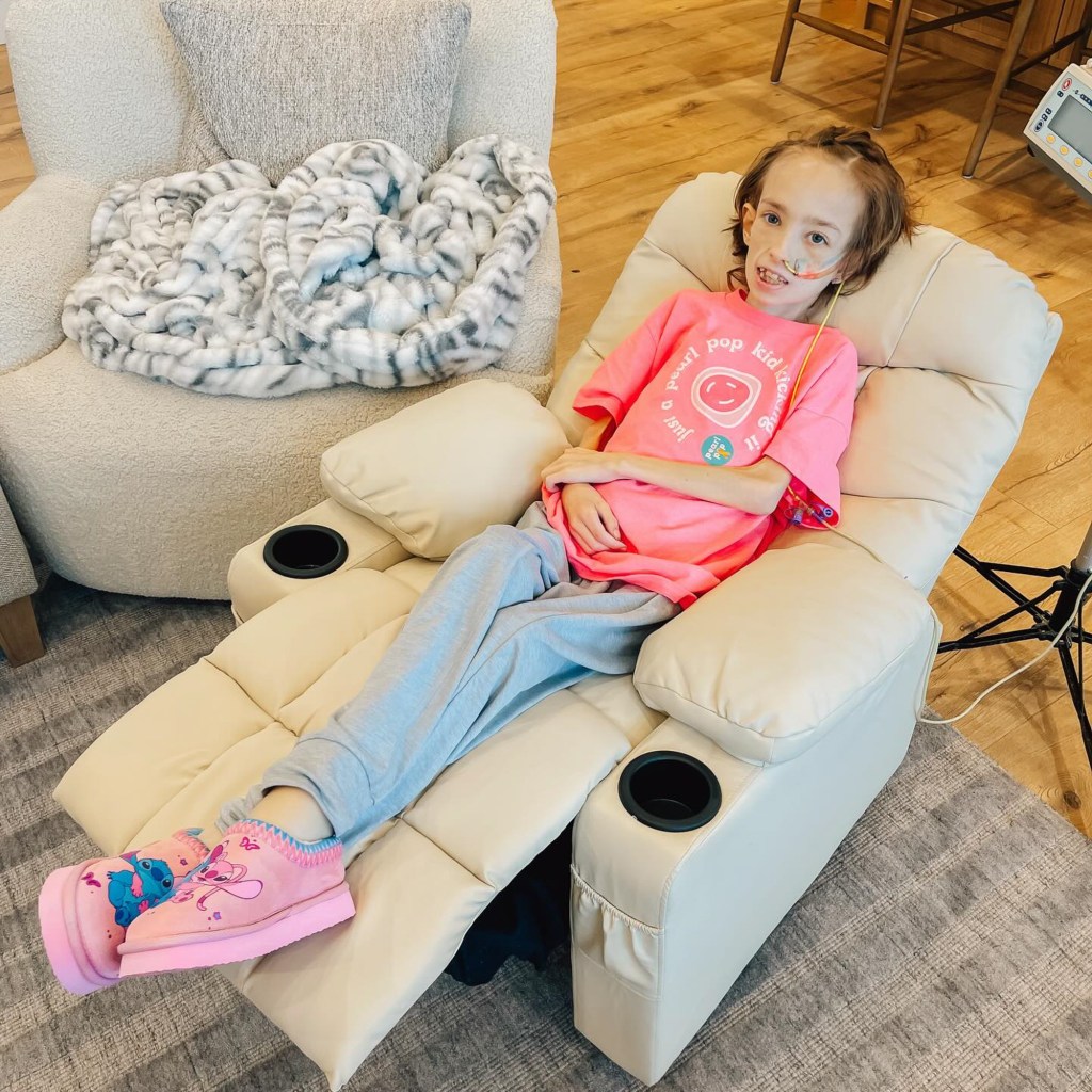 Brie Bird reclines in a chair in a shot posted to social media.