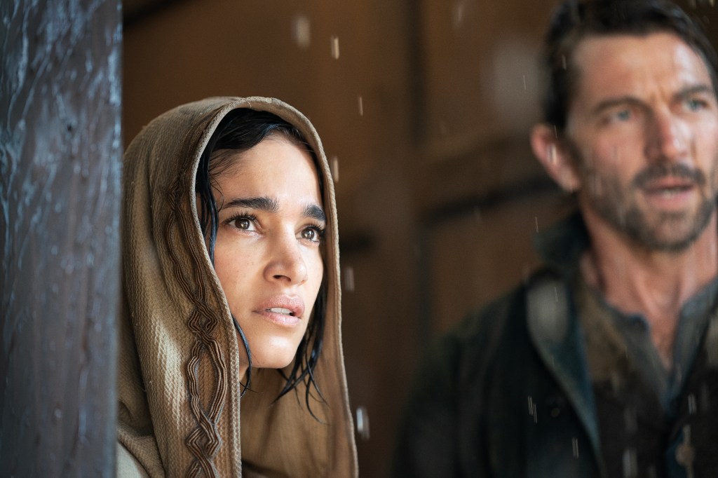 Sofia Boutella as Kora and Michiel Huisman as Gunnar in Rebel Moon.
