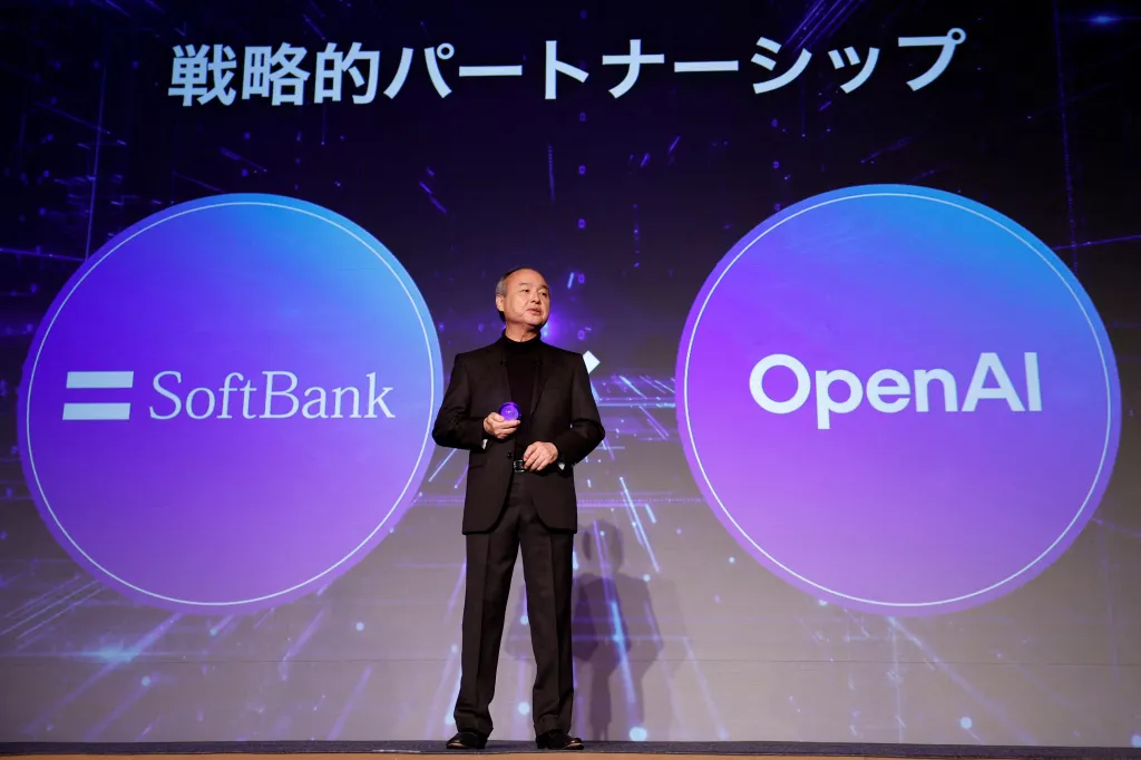SoftBank CEO Masayoshi Son presenting a partnership with SoftBank and OpenAI.