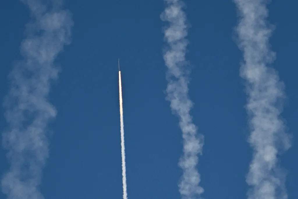 Chinese People's Liberation Army (PLA) soldiers fire a rocket into the air as they conduct military drills on Pingtan island, in eastern China's Fujian province, the closest point to Taiwan, on December 30, 2025.