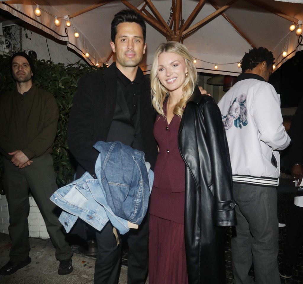 Stephen Colletti and Alex Weaver posing for a photo.
