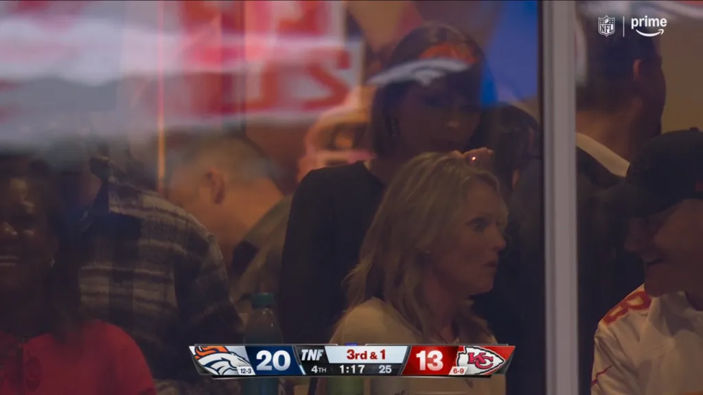 Taylor Swift looks on nervously, biting her nails during the Chiefs game.