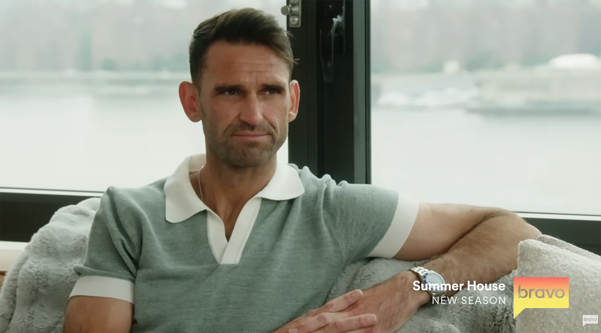 Kyle Cooke in a light green polo shirt.