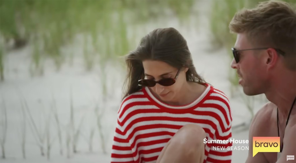 Kyle Cooke and Amanda Batula from Summer House, with Amanda looking down while Kyle speaks.