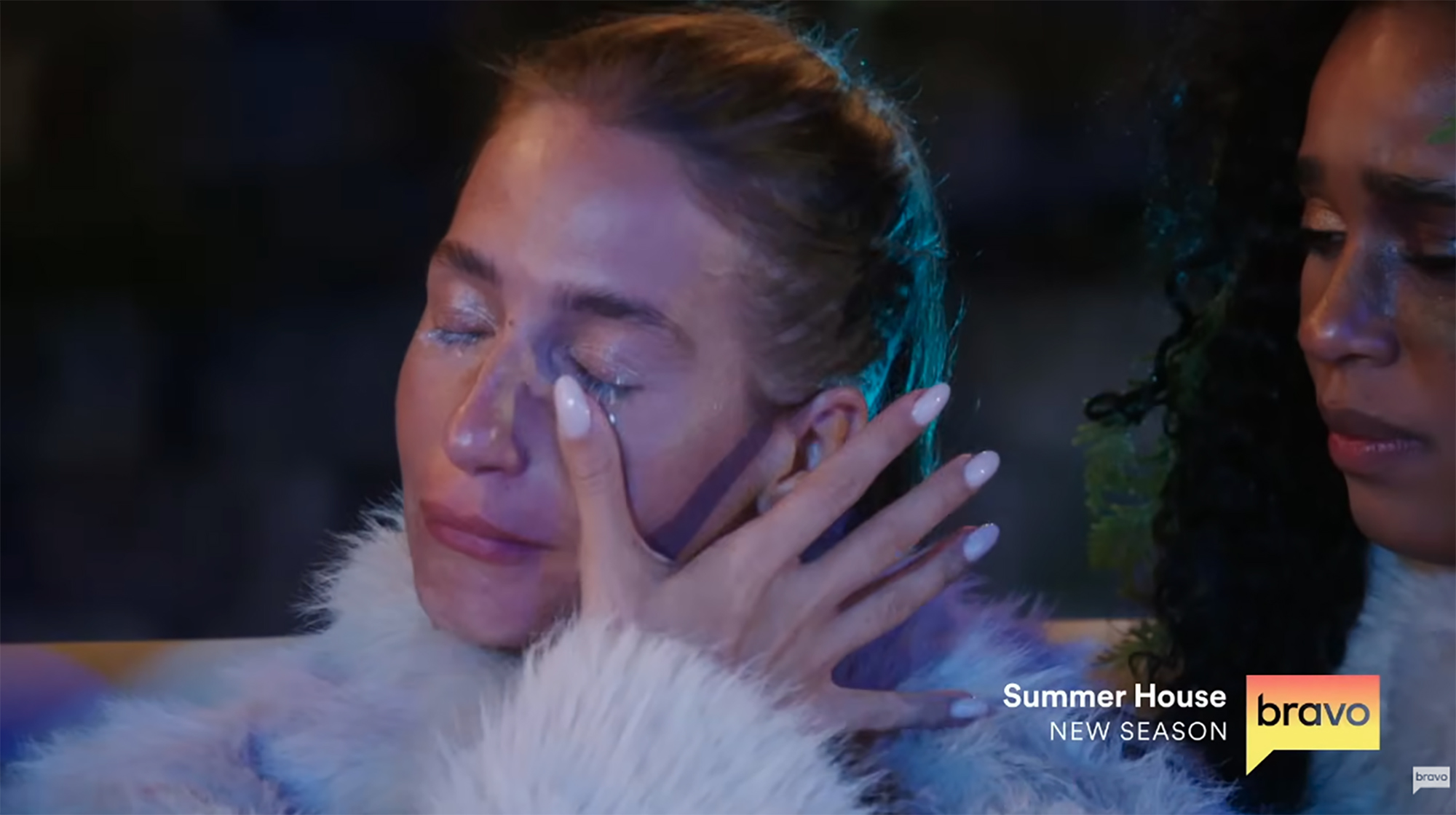 Amanda Batula crying with glittery tears.