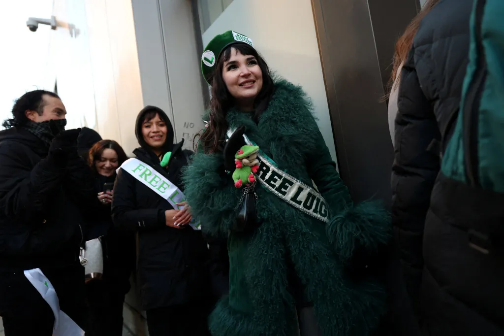 Supporters of Luigi Mangione gather outside Manhattan Criminal Court.