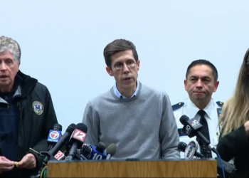 Live updates
Authorities seek Brown University shooting suspect as they release person of interest