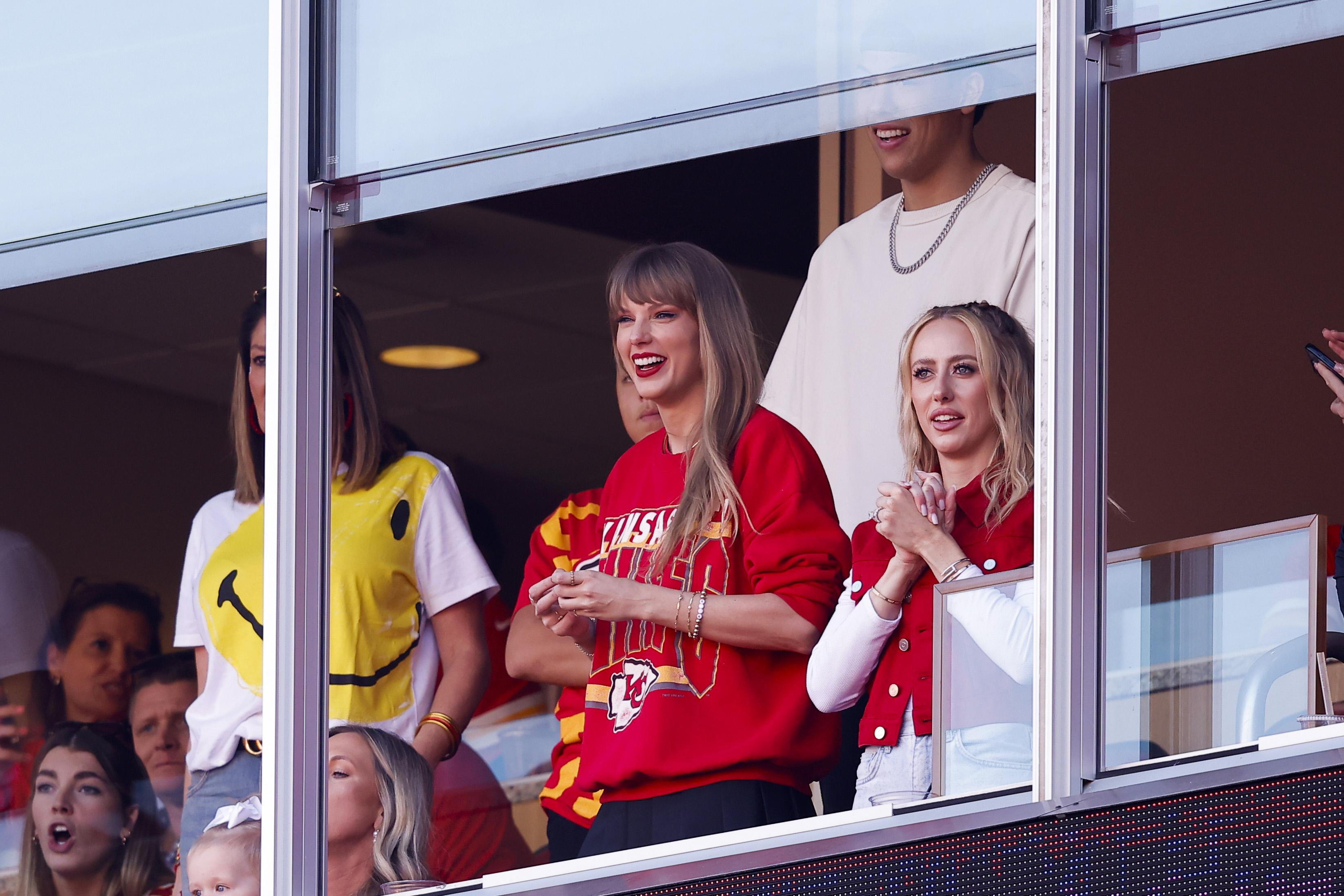 Taylor Swift and Brittany Mahomes watching a Kansas City Chiefs game.