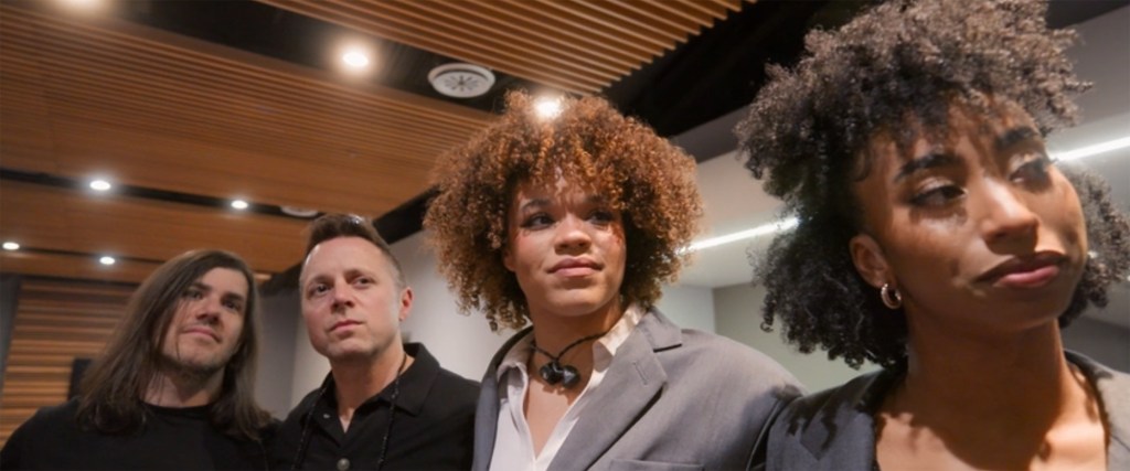 Four musicians from the Taylor Swift The End of an Era Tour documentary.