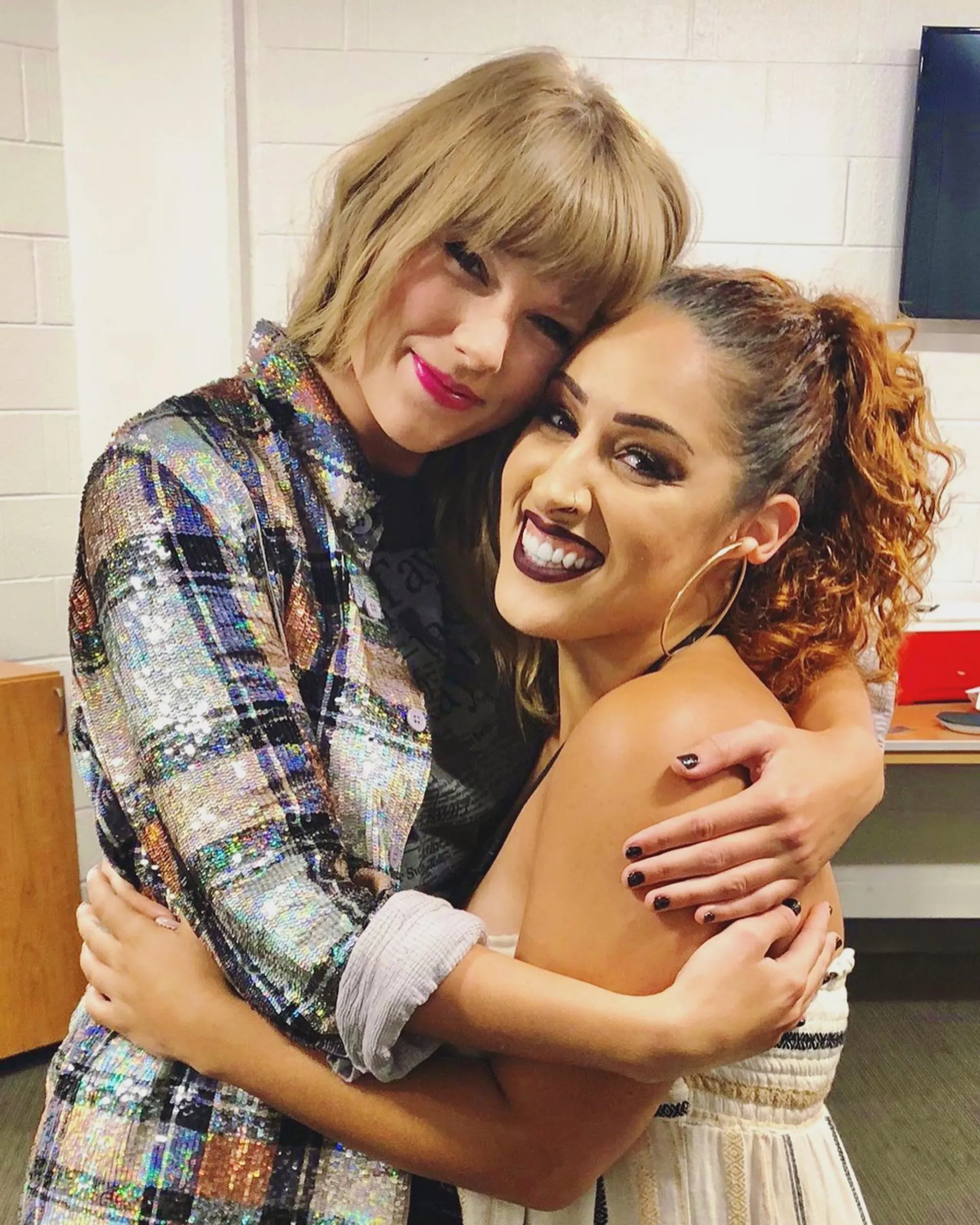 Taylor Swift embracing a dancer who had an