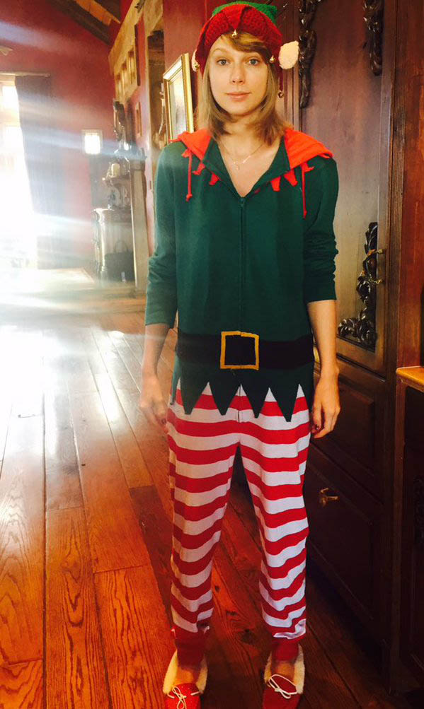 Taylor Swift dressed in an elf costume.