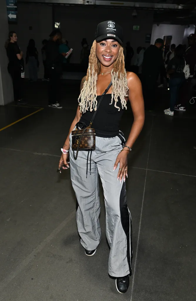 Mickey Lee seen backstage during the Truth 2 Power tour at State Farm Arena on October 14, 2025 in Atlanta, Georgia